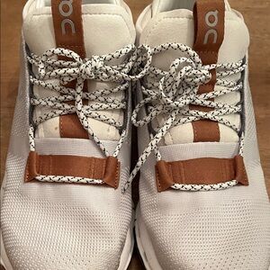 On Running White and Tan Sneakers